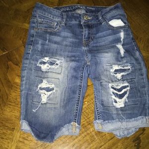 Blue ripped jean shorts